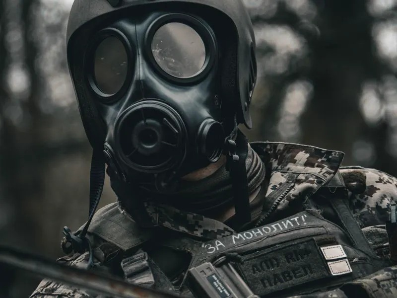 Technician wearing a respirator mask for safe application